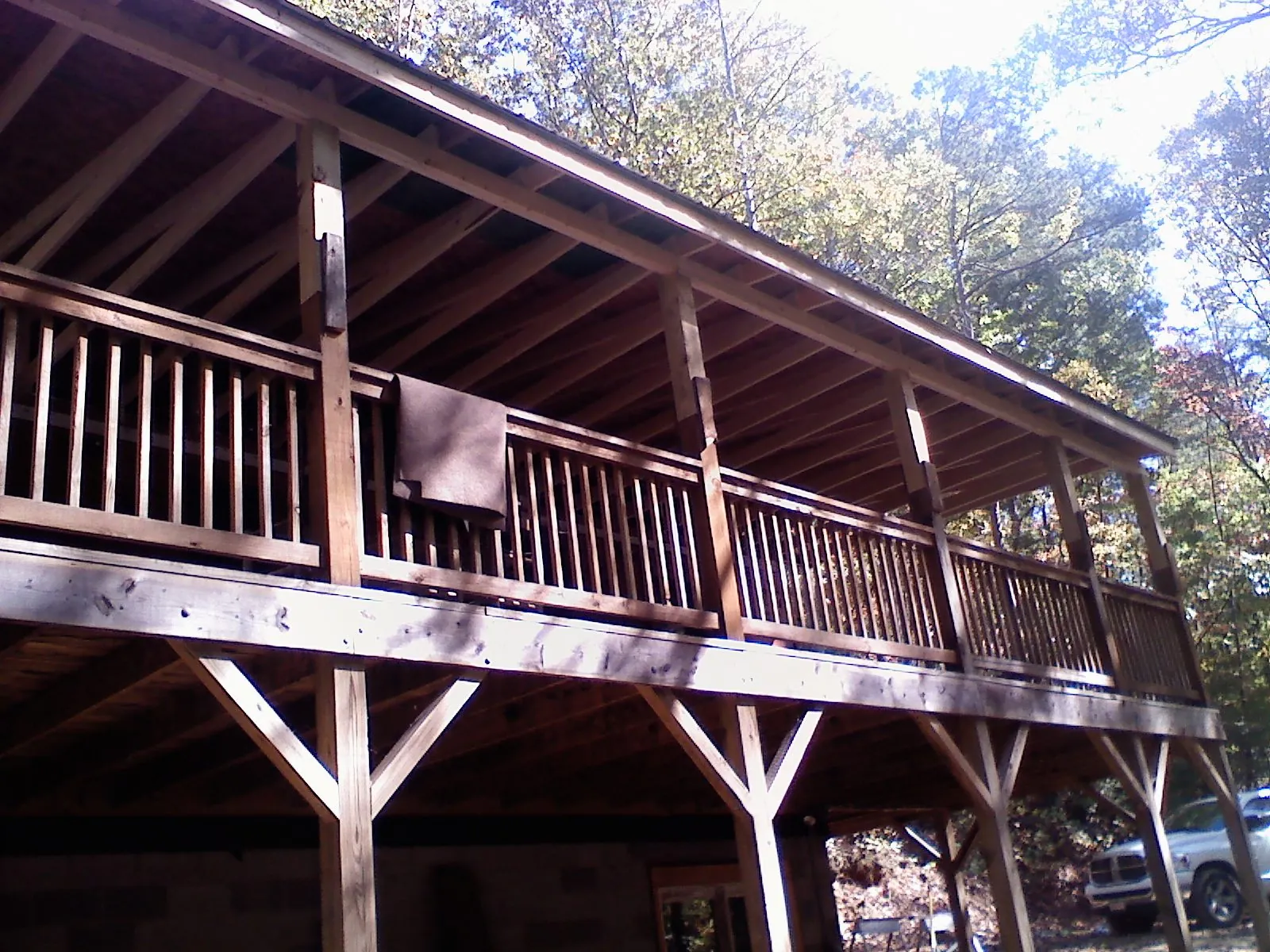 Timber framing under a new elevated porch and deck — Roof Leak Repair in Wirtz by Roofing Brothers